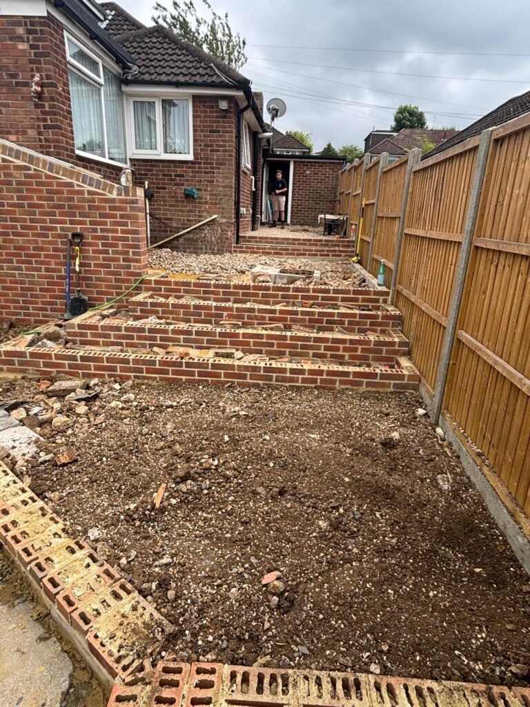 Step and pathway layout with brick foundations – back garden hard landscaping project Essex