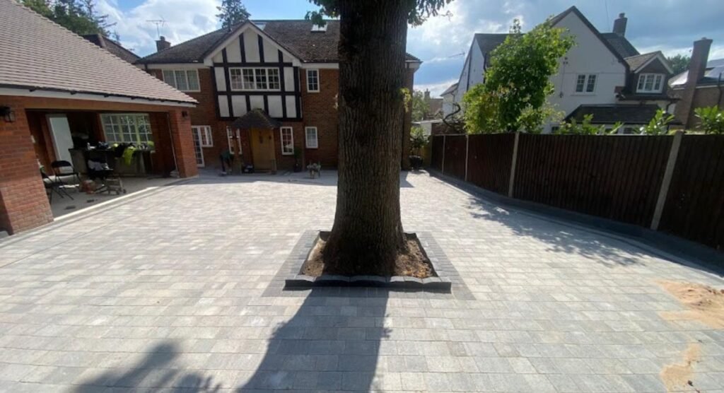 Completed block paved driveway with central tree feature – premium paving Essex