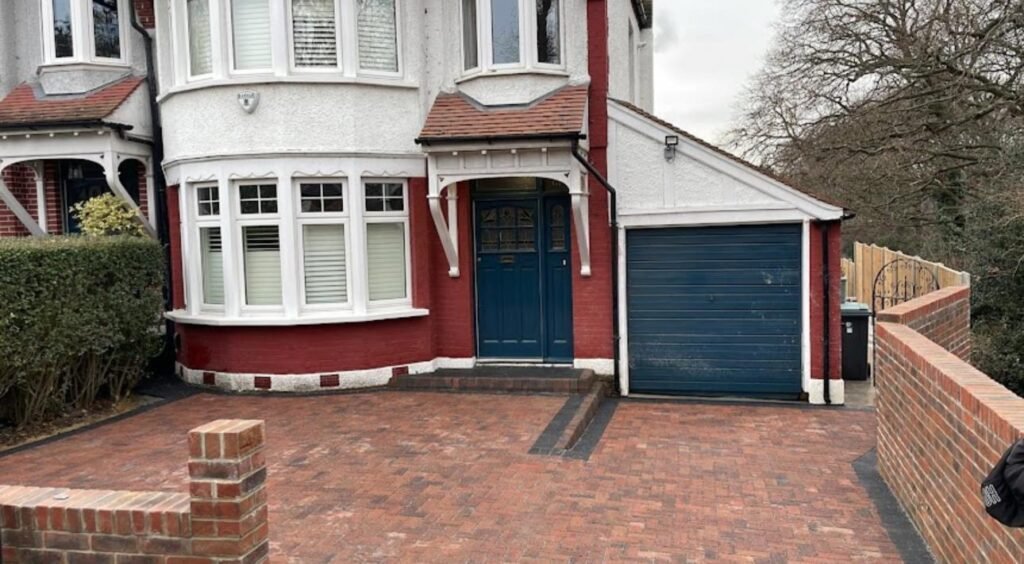 Red brick driveway with curved steps and recessed manhole – front garden upgrade Essex